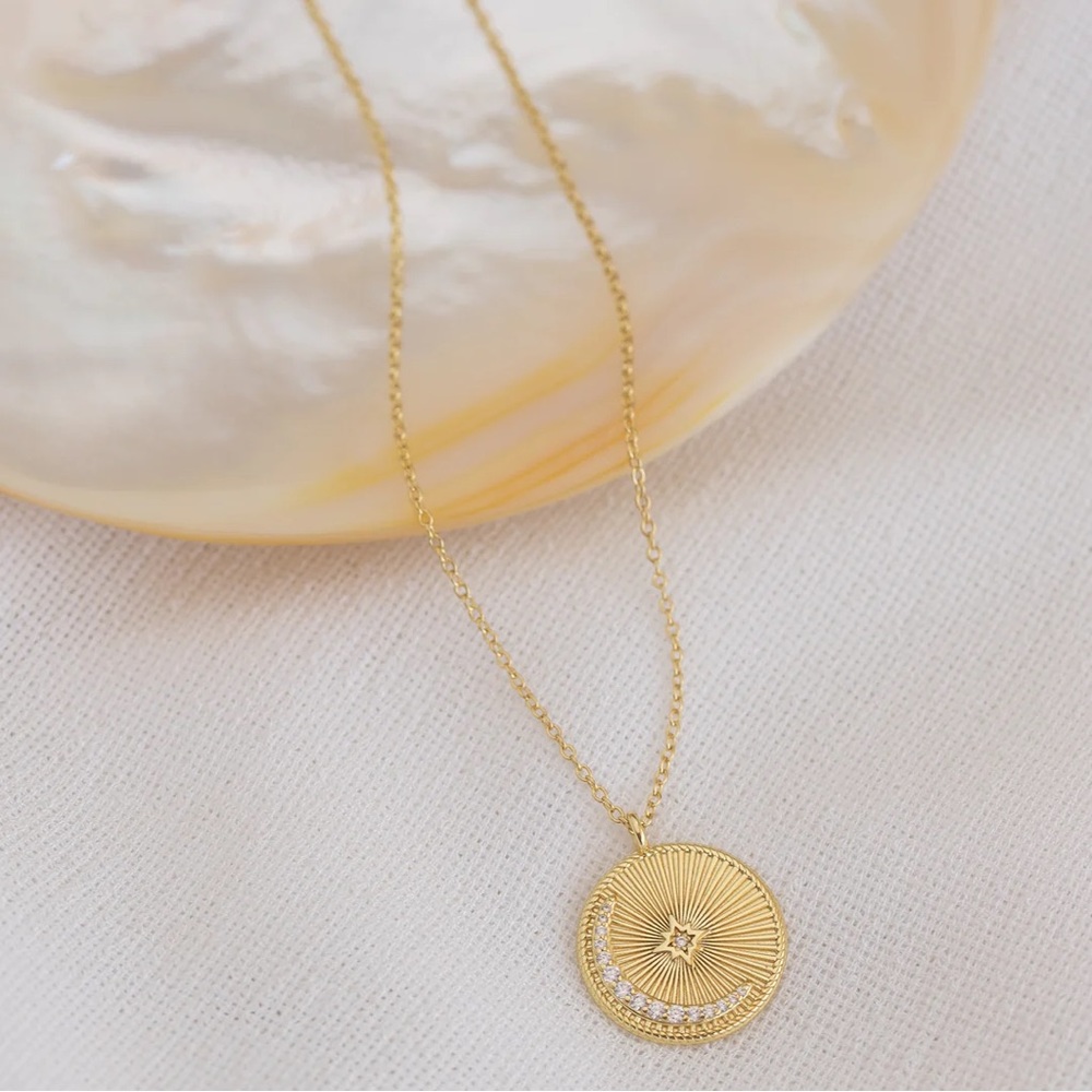 Brand new Misha Hawaii Necklace. Never been worn.  Crescent Moon Coin Necklace